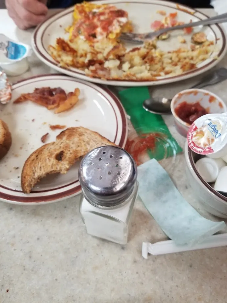 Eggs Potatoes Bacon Wheat Toast and Jelly